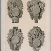 Cartels ou baromètres en bois sculpté.