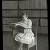 Library for the Blind, girl reading The Velveteen Rabbit in the loan collection at New York Institute for the Blind, May 1926