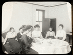 Melrose Branch, women sitting around table with table cloth, Jan. 10, 1914