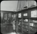 Morrisania Branch, boys looking at exhibit in Morrisania Children's room, Apr. 25, 1911.