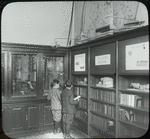 Morrisania Branch, boys looking at exhibit in Morrisania Children's room, Apr. 25, 1911