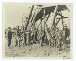 Group of miners with their drilling tools