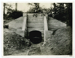 Coal mines are named among miners in accordance with the method of approach from the surface to the vein. The entrance pictured above is a ? and full cars are hauled uphill to the surface opening. This particular slope mine is famous because within it the U.S. Bureau of Mines conducts a great variety of mining experiments.