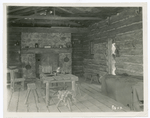 Interior of the Johnston cabin at Watauga in the Tennessee mountains, built on location at Whitestone, Long Island