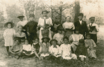 Typical group of Gary, Indiana school children. Top row standing : left to right, Greek, Negro, Roumanian, Lithuanian, Italian, Polish, Croatian, Hungarian. Middle row, American, Austrian, German, Bulgarian, front row, Scotch, Russian, Irish, Assyrian, Slavish, Jewish and Spanish. Do these children look American?