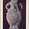 Vase en terre émaillée. H. 360 mm., plus grande L. 130 mm. (Chine. Dynastie Tang)