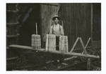 Utilization of wood waste. The rough squares bolted from slabs and edgings of the Emporium Lumber Company at Keating Summit, and the turned products, chair stock, made from them. Exterior of warehouse where cars are loaded with chair stock. The woods used are beech, birch, and maple.