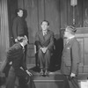 Horace Braham as Capraro (seated).
