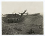 Loading iron ore, open pit mine, 300 ton Marion steam shovel, Missabe Range, Minnesota.
