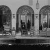 Setting designed by James Whale for "A hundred years old."