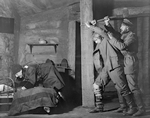 L to R: Herbert J. Biberman (Supervisor), Frank Conroy (Richard, with gun) and Otto Kruger (Karl).
