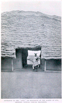 Entrance to the "Afin" or residence of the Alafin of Oyo, showing typical Yoruba thatching