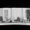 Reginald Mason (standing) as Professor Higgins, and J.W. Austin, seated, as Colonel Pickering. Setting designed by Jo Mielziner for the Guild's production of Shaw's "Pygmalion" (1926 Revival). NYC: Guild Theatre.