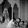 Scene from "Marco Millions", Guild Theatre, 1928. Set and costumes designed by Lee Simonson. Alfred Lunt (Marco Polo), Henry Travers as Nicolo and Ernest Cossart as Maffeo (extreme right).