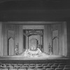 Baliol Holloway as Kublai (on throne), Margalo Gillmore as Kukachin (on the catafalque) et al.