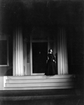 Alice Brady as Lavinia Mannon on steps of Mannon Mansion.