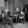 Martin Berkeley as Sherman Maxwell, Leonard Loan (center, standing)as Mullin, and Alfred Lunt as Raphael Lord.