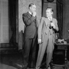 Alfred Lunt as Raphael Lord (left) and Lawrence Leslie as Curtis Maxwell (right).