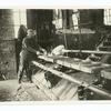 Pouring zinc into molds, zinc smelter in Utah.