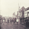 Liberian militia in review order (white uniform, blue sashes)