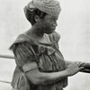 A Basa woman of the civilised type (becomingly and appropiately clothed).