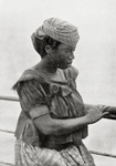 A Basa woman of the civilised type (becomingly and appropiately clothed).