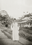 A Gbandi horn - blower blowing ivory trumpet (at Gene, Mano River, Western Liberia).