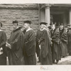 Alexander Black at St. Lawrence University (?) to receive an honorary degree, flanked by Owen Young, John Hayes Holmes, and Andrew Mellon.