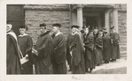 Alexander Black at St. Lawrence University (?) to receive an honorary degree, flanked by Owen Young, John Hayes Holmes, and Andrew Mellon.