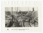 Method of unloading ore from boats about 1875.