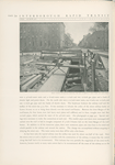 Special riveted rectangular water pipe, over roof of subway at 126th Street and Lenox Avenue.