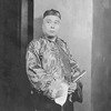 Seungman Ahn as Wang Fu, a Commission Man, featured in "Roar China" (1930).