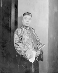 Seungman Ahn as Wang Fu, a Commission Man, featured in "Roar China" (1930).