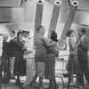 Scene from "Roar China." NYC: 1930. Eva Condon, Athy Dmitrieff, Winifred Hanley, Eric Blore, Reynolds Denniston, Adrienne Lachamp, Sanchia Robertson and Harry Cooke.