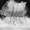 Chinese coolies on quay in harbor of Wan Hsien. Setting by Lee Simonson.