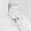 Georgette Harvey as Maria.