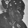 Aunt Africa.  "Ise gwine t' heah dem heabenly ban's An' feel de tech of de ole-time han's Dat long hab passed away."