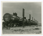 Tank cars and loading apparatus.