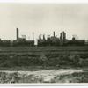 Skyline of Sunburst refinery from banks of Missouri