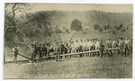 Group of men laying a pipeline