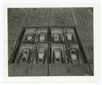 Showing that agitation is maintained by compressed air until ice blocks are completely frozen. These cans are about ready for dumping. City Ice Co., Easton, Penna.