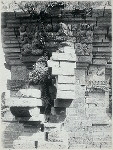 Java, East: Antiquities. Jedong [monument]. Base of Chandi Djedong with kala-head ornament. Southern side (part of second gateway, Modjosari, Modjokerto