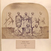 Magar group, military tribe, Nipal. [5 men standing and 3 men sitting, all with weapons]