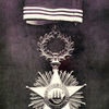 The isignia of the Liberian order of Africa Redemption, founded by President A. W. Gardner in 1879.