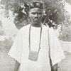 Mandingo wearing amulet.