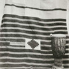 Large piece of cotton-stuff woven and dyed in Western Liberia, also drum from western Liberia.