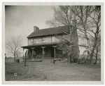 The old stone house, opposite the western gateway and on adjunct one.