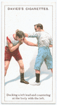 Ducking a left lead and countering at the body with the left.
