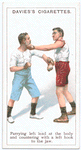 Parrying left lead at the body and countering with a left hook to the jaw.