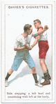Side stepping a left lead and countering with left at the body.